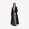 Baggy-jeans for kvinner med lav skritt i skitten vintageblå