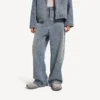 Baggy jeans for menn med denim-søm i mørkeblått