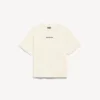 Balenciaga-T-skjorte for kvinner med medium passform og «Balenciaga Back»-motiv i kremfarge