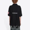 Balenciaga x NASA Crossover FW21 romfartsmønstret bomullspique-skjorte i ensfarget svart for menn 662493TKVG11070