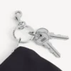 Charm-veske med glidelås for menn i svart