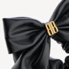 Clemence XL-scrunchie for kvinner i svart/gull