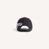 Cursive-cap for menn i vasket svart