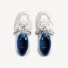 Hamptons-sneakers for menn i slitt look, i hvitt/mørkeblått/grått