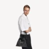 Herre-shopper med støvpose, crossbody-veske, medium, i svart