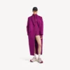 Kort langermet bodysuit for kvinner i fargen fiolett/oransje