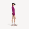 Kort langermet bodysuit for kvinner i fargen fiolett/oransje
