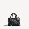 Le City-veske for kvinner, liten, med store nitter og rhinestones i svart