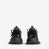 Men’s Track sneaker med piercinger i svart