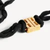 Nano-bånd-choker for kvinner i svart/skinnende gull