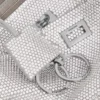 Rodeo-slingpochette for kvinner med rhinestones i røykgrå