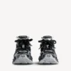 Runner-sneaker for kvinner i svart/sølv