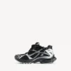 Runner-sneaker for kvinner i svart/sølv