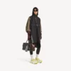 Teknisk poncho for menn i svart