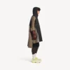 Teknisk poncho for menn i svart