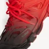 Track-sneaker i rød/svart med fargegradient