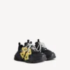 Triple S Tape Type sneaker for menn i svart/gult