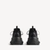 Triple S Tape Type sneaker for menn i svart/gult