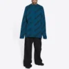 Ullstrikket genser med rund hals og logo over hele «Petrol Blue» 657400T15672470